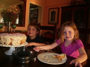 Here's the two kiddos enjoy a snack after some time at the pool.  (I had a bite; it's really good!) We'll have cake for dessert too! Yummers! :D