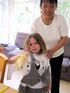 This is Pei (pronounced "pay") with Gigi.  She knitted Gigi a little doggie for her birthday.  Pei is great!  We really like her.