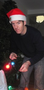 Elfo Kevito always has the tough job of putting up the lights.