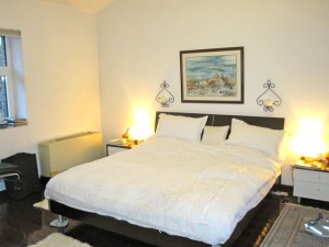 img_2438 We finally got reunited with our Nain carpet to the right of the master bed.