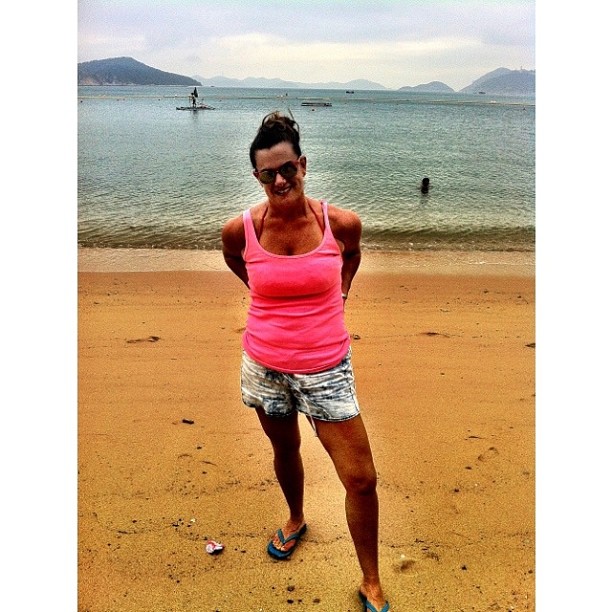Beach Ready in Acid Wash Jeans and a Bright Pink Tank